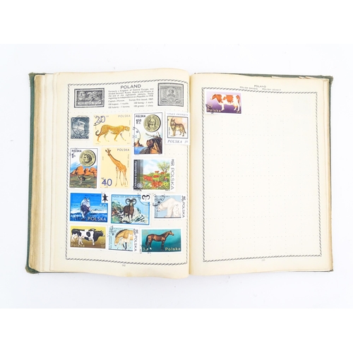 2000 - A 'Cromwell World's Stamp Album', containing a quantity of British and worldwide postage stamps, tog... 