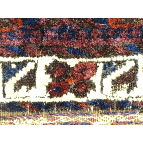 11 - Rug : A woollen saddle bag style rug.  Approx. 46