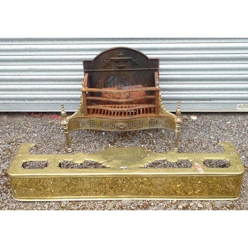17 - A mid/late 20thC cast iron and brass fire basket with integral back plate, together with an early 20... 