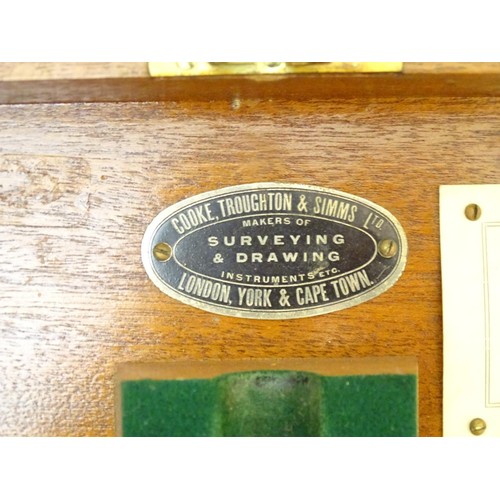 33 - A surveyor's level theodolite by Cooke Troughton and Simms in original fitted box with instruction m... 