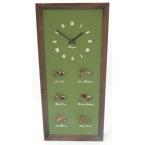 35 - Fly - Fishing : A Monogram battery wall clock with 6 mounted and named Salmon flies , measuring 22