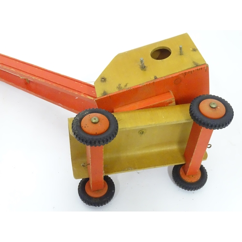 64 - Toy: A scratch built wooden crane with painted detail. Approx. 17