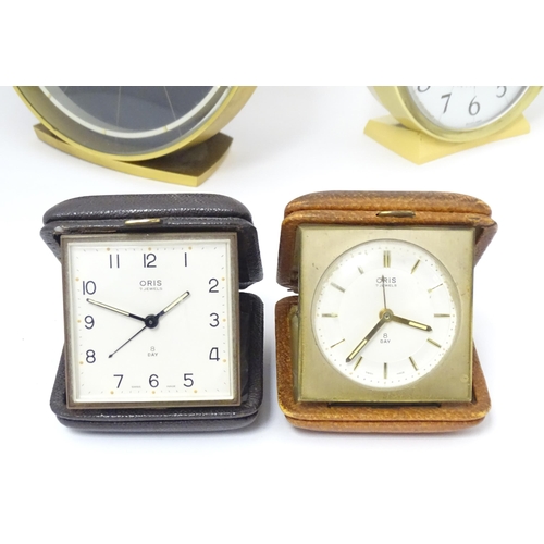 68 - Mid 20thC clocks, comprising: a Westclox Big Ben repeater mantel clock, a Junghans cube formed alarm... 