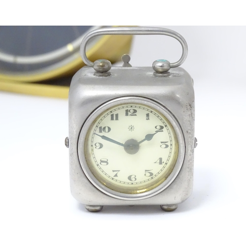 68 - Mid 20thC clocks, comprising: a Westclox Big Ben repeater mantel clock, a Junghans cube formed alarm... 