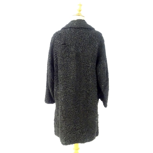 82 - Vintage fashion / clothing: A beaver lamb / mouton fur style coat, button fastening to the front, bu... 