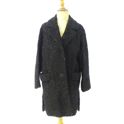 82 - Vintage fashion / clothing: A beaver lamb / mouton fur style coat, button fastening to the front, bu... 