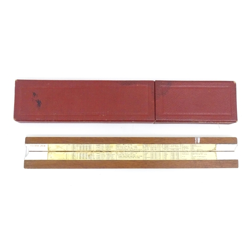 106 - Two artist's tools comprising an early 20thC wooden T-square by Winsor & Newton Ltd., and a George R... 