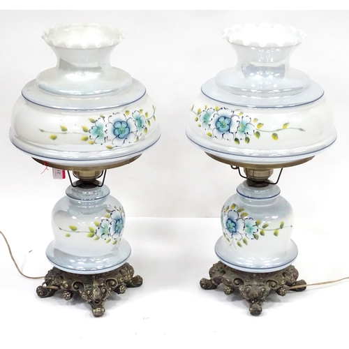 170 - A pair of Continental electric table lamps formed as oil lamps with floral decoration, each approx 2... 