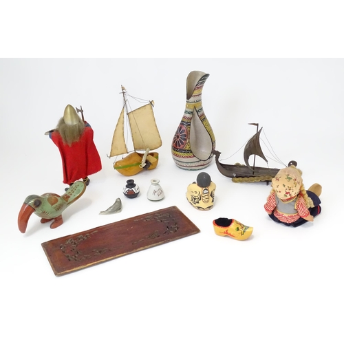 174 - A quantity of assorted miscellaneous items to include dolls, a novelty lamp modelled as a boat made ... 