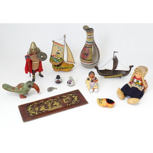 174 - A quantity of assorted miscellaneous items to include dolls, a novelty lamp modelled as a boat made ... 