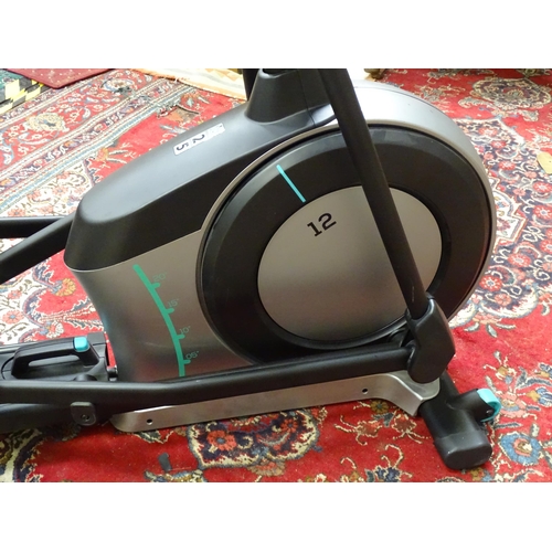 177 - A Decathlon 'Domyos' cross trainer, with power cable and manual, approximately 75