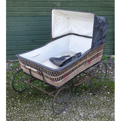 A large Victorian pram / spinal / invalid carriage. The wicker ...
