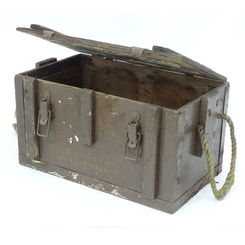 18 - Militaria : a post-WWII wooden ammunition crate, the interior with base sections to fit eight jet en... 