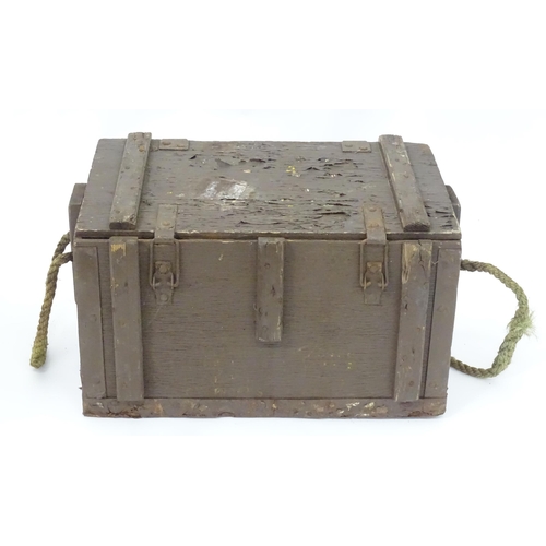 18 - Militaria : a post-WWII wooden ammunition crate, the interior with base sections to fit eight jet en... 