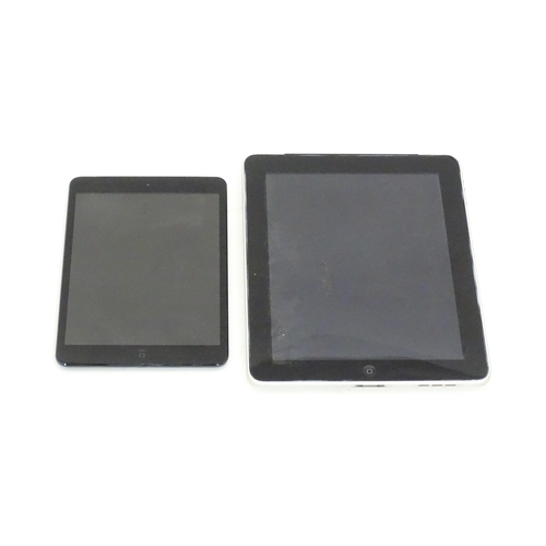 349 - Two Apple iPads to comprising a silver iPad Model A1337 and a black iPad Mini Model A1455 (2)
