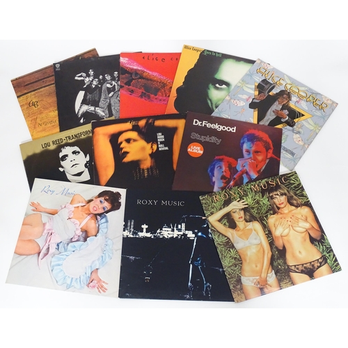 391 - Vinyl records : a quantity of 33rpm LPs, various artists - rock artists of the 70s, comprising Lou R... 