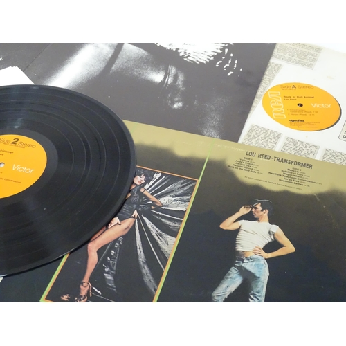 391 - Vinyl records : a quantity of 33rpm LPs, various artists - rock artists of the 70s, comprising Lou R... 