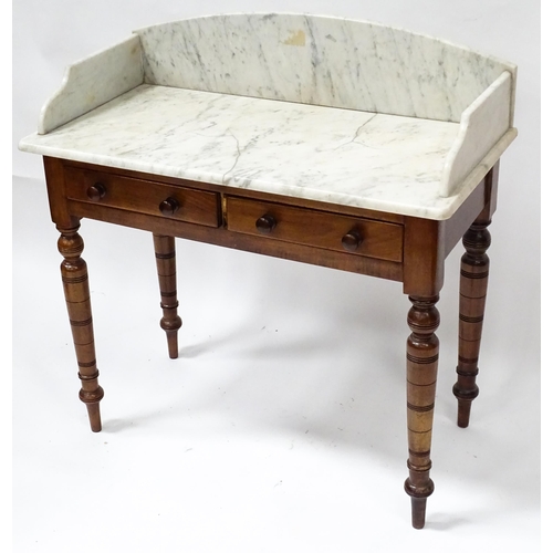 29 - A late 19thC marble topped table wash stand, the base with two drawers, standing approx 36