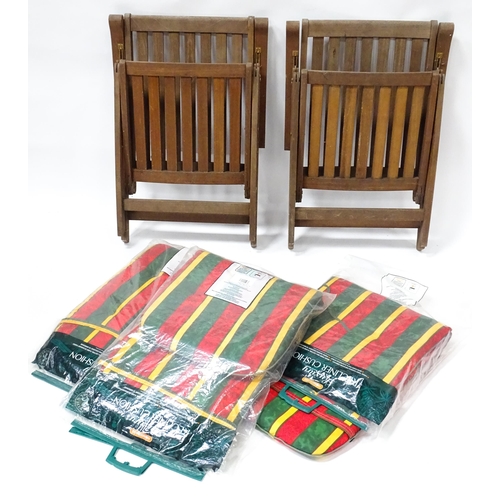 835 - Two teak garden chairs, with cushions