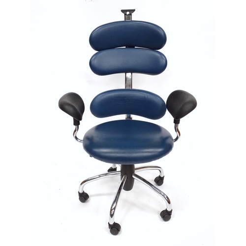 836 - An Italian blue swivel office chair. Bearing label under 'Lamm Spa'.