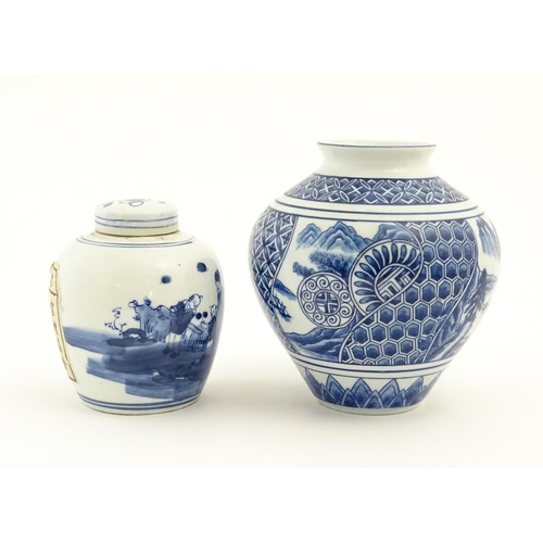 55 - A Chinese blue and white ginger jar and cover decorated with figures in a landscape. Together with a... 