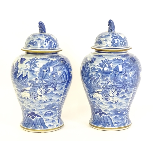 63 - A pair of large Chinese blue and white ginger jars of baluster form with continuous decoration depic... 