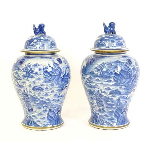 63 - A pair of large Chinese blue and white ginger jars of baluster form with continuous decoration depic... 