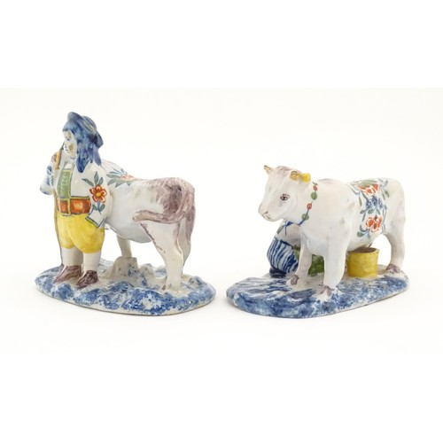 86 - Two French Quimper style faience figural models comprising cow and milk maid, and man with cow. Larg... 