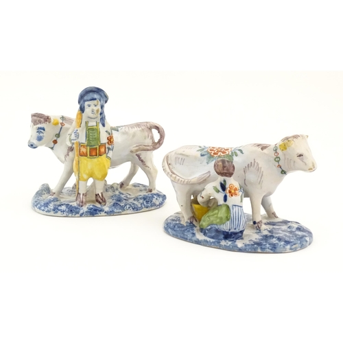 86 - Two French Quimper style faience figural models comprising cow and milk maid, and man with cow. Larg... 