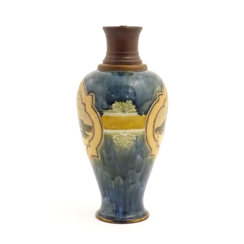 118 - A Doulton Lambeth Florence Barlow stoneware lamp base of vase form, the mottled blue ground decorate... 