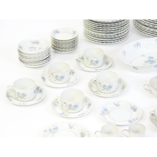 169 - A quantity of Haviland Limoges dinner wares in the Bergere pattern to include plates, serving dishes... 