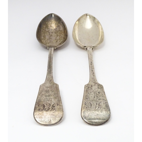 265 - A pair of Geo III silver fiddle pattern basting / serving spoons. Hallmarked London 1819 maker J.W a... 