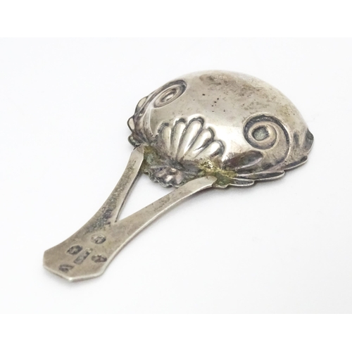 266 - A Geo III silver caddy spoon with engraved decoration and bifurcated handle . Hallmarked Birmingham ... 