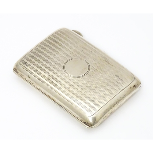 269 - A silver cigarette / cheroot case with  banded engine turned decoration Hallmarked Birmingham 1915 m... 