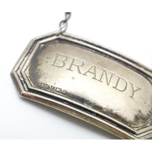 270 - A decanter label / bottle ticket engraved 'Brandy' hallmarked Birmingham 1990 maker W I Broadway & C... 