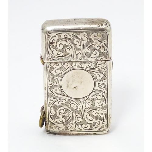 271 - An early 20thC silver lighter with engraved acanthus scroll decoration hallmarked Birmingham 1909 ma... 