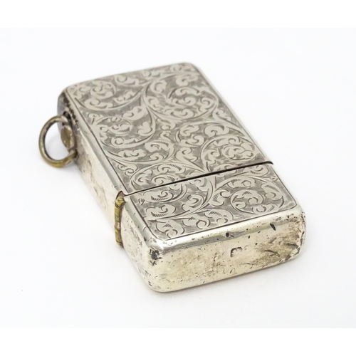 271 - An early 20thC silver lighter with engraved acanthus scroll decoration hallmarked Birmingham 1909 ma... 