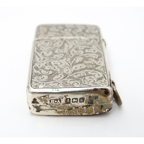 271 - An early 20thC silver lighter with engraved acanthus scroll decoration hallmarked Birmingham 1909 ma... 