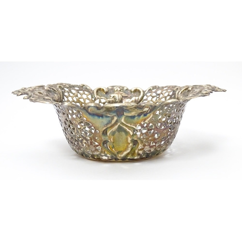 272 - A silver bonbon dish with embossed and pierced decoration hallmarked Birmingham 1904 maker William H... 