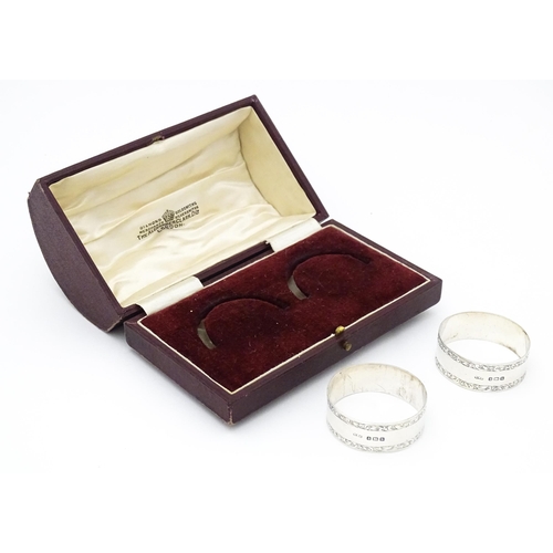 273 - A cased pair silver napkin rings hallmarked  Birmingham 1917 maker William Walter Cashmore. The case... 