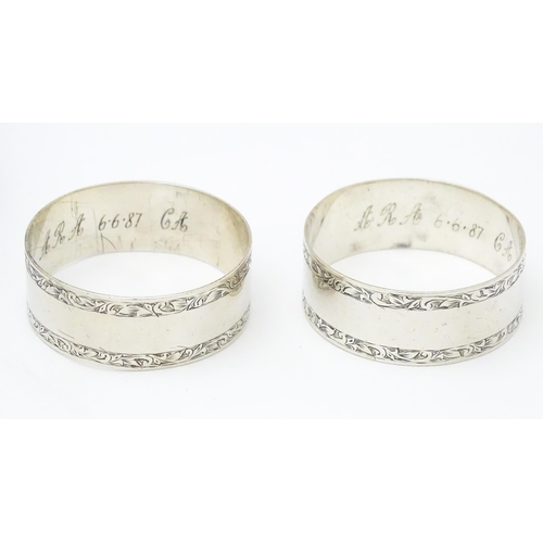 273 - A cased pair silver napkin rings hallmarked  Birmingham 1917 maker William Walter Cashmore. The case... 