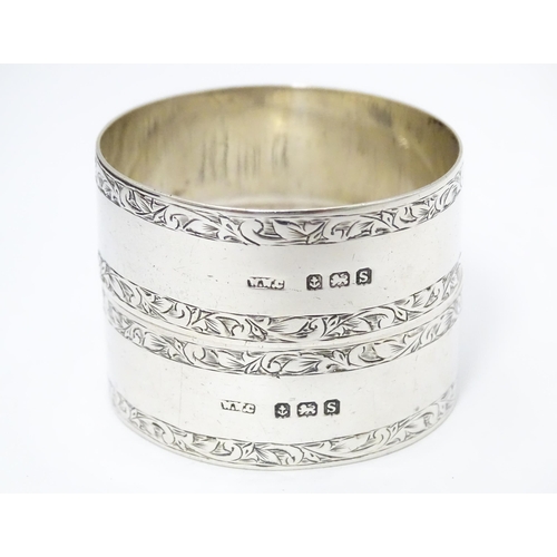 273 - A cased pair silver napkin rings hallmarked  Birmingham 1917 maker William Walter Cashmore. The case... 