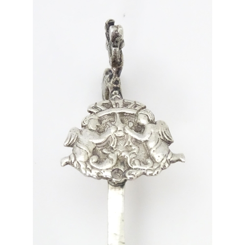 275 - A Dutch silver caddy spoon with embossed decoration. Approx. 4 3/4