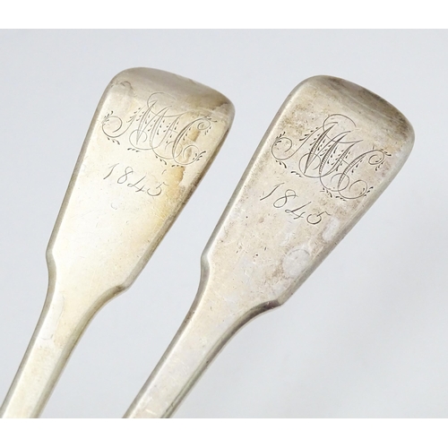 283 - A pair of fiddle pattern tablespoons hallmarked London 1837 maker Benjamin Smith III. Approx 8 3/4