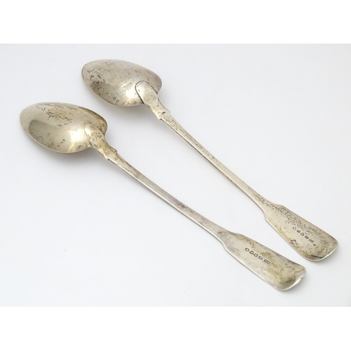 286 - Two silver fiddle pattern serving / basting spoons one hallmarked London 1817 the other London 1820.... 