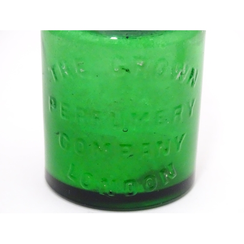 287 - The Crown Perfumery Company London : A green glass jar and stopper with silver sleeve  hallmarked Bi... 