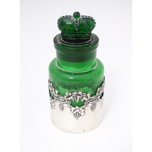 287 - The Crown Perfumery Company London : A green glass jar and stopper with silver sleeve  hallmarked Bi... 