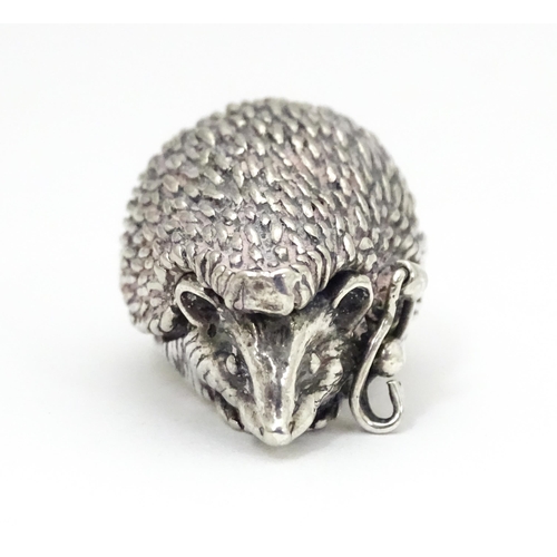 289 - A white metal novelty pill box modelled as a hedgehog. Approx. 1 1/2