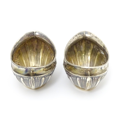 292 - A pair of silver salts with embossed decoration. hallmarked Birmingham 1904 maker Joseph Gloster Ltd... 