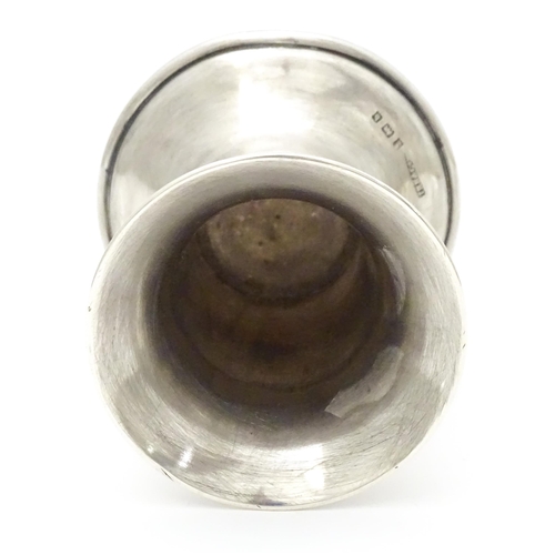 293 - A small silver vase / spill vase hallmarked Birmingham 1901 maker T H Hazlewood & Co. Approx. 2 1/2